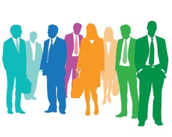 Several business men and women standing